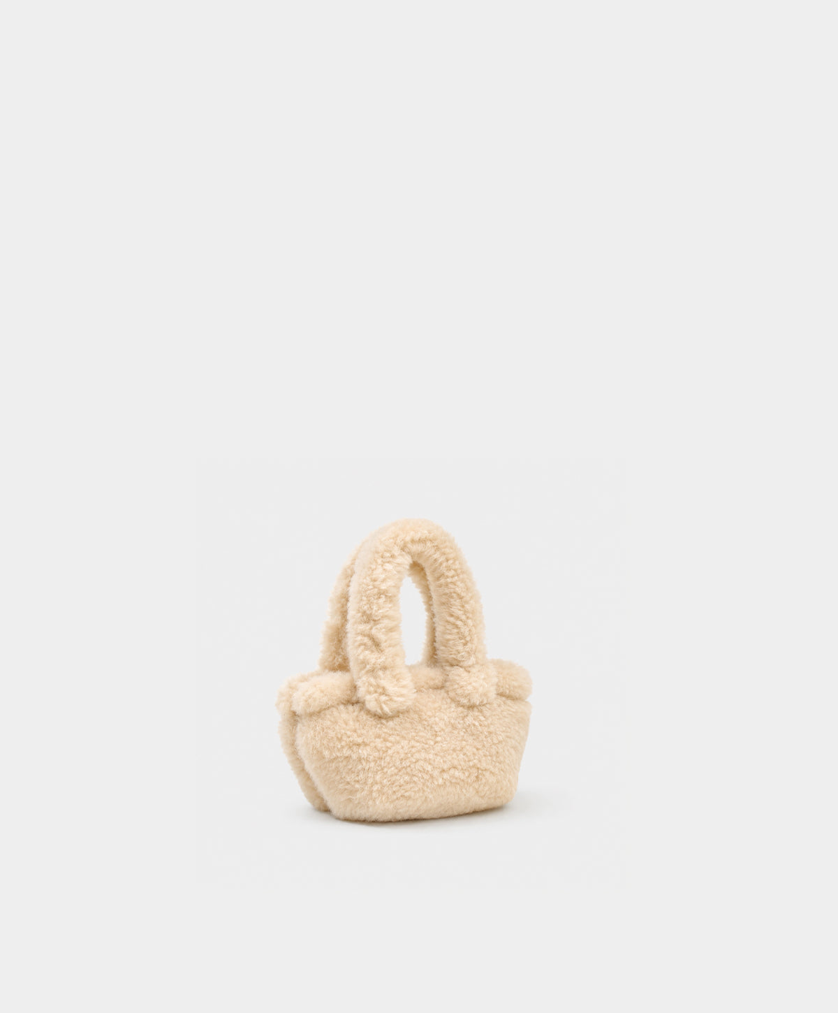 Faux Shearling Handbag & Bag Charm Collection