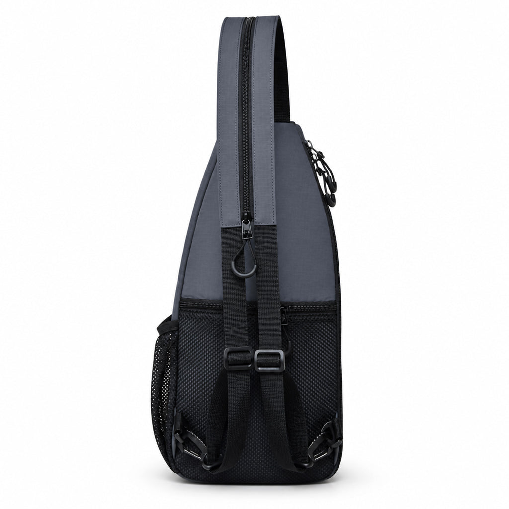 Rear zip pocket and zip-together shoulder straps on the pickleball sling backpack.