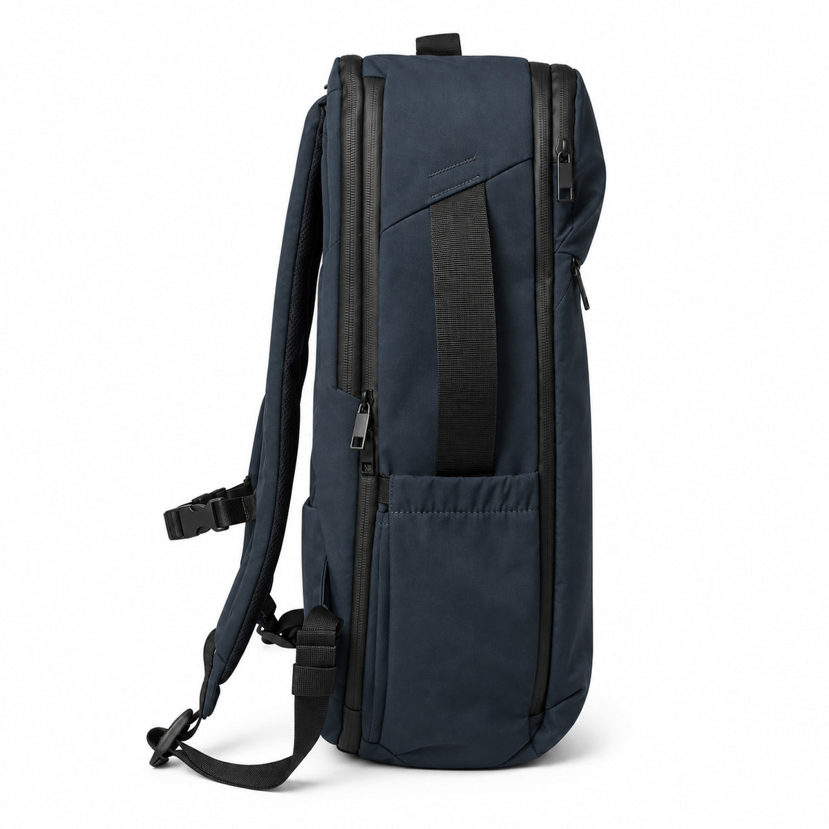 Side view of the navy travel backpack showing the carry handle, side pocket and zippers.