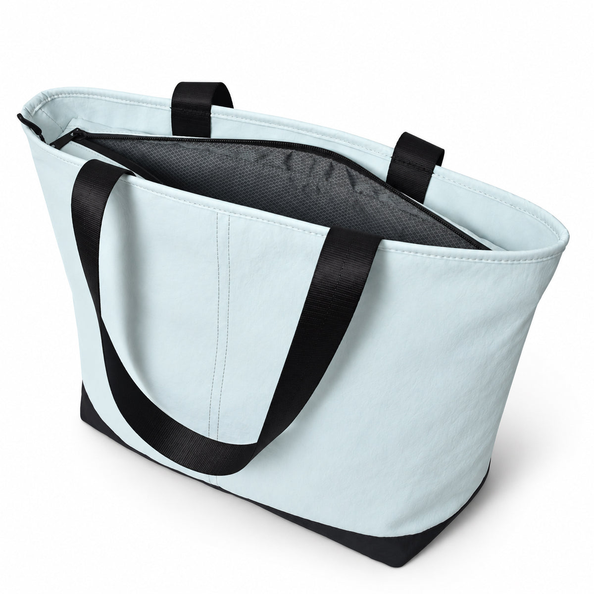 Open light blue tote showing the dark textured lining.
