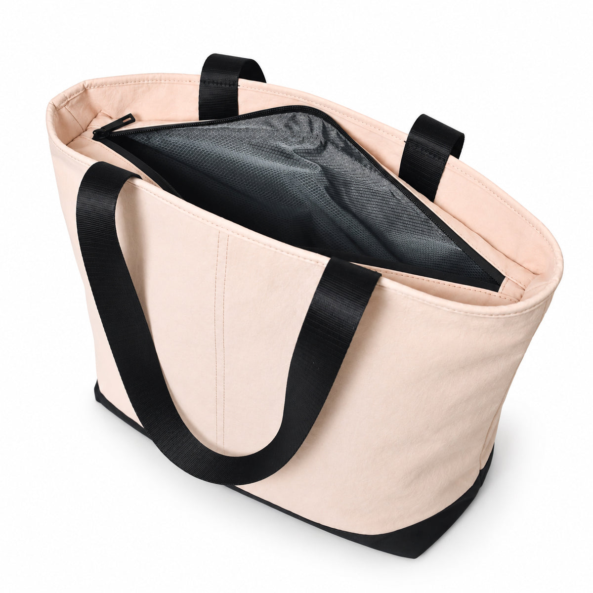 Open blush pink tote showing its dark textured lining.