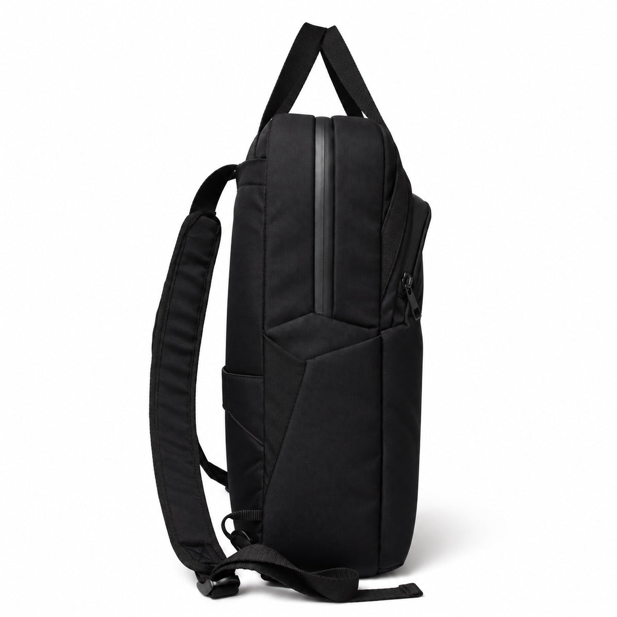 Side view of the black tote backpack showing its side pocket and slim profile.
