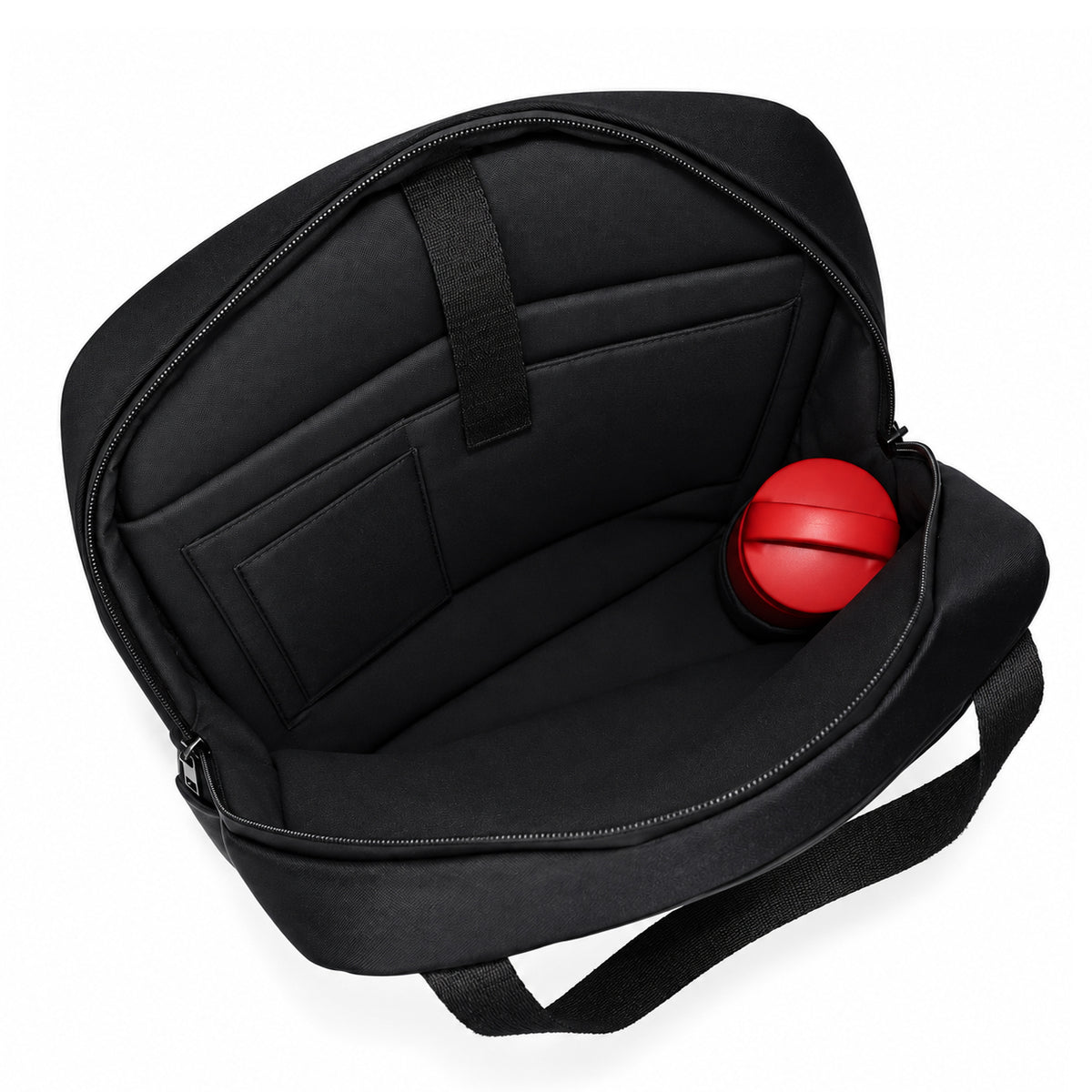 Open black tote backpack showing inner pockets, a retaining strap and an illustrative red bottle.